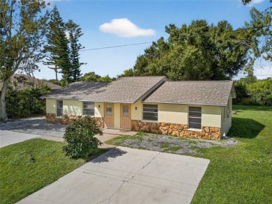 GREAT INCOME OPPORTUNITY IN ENGLEWOOD EAST! Duplex with each on Duffys Golf Center in Florida - for sale on GolfHomes.com, golf home, golf lot