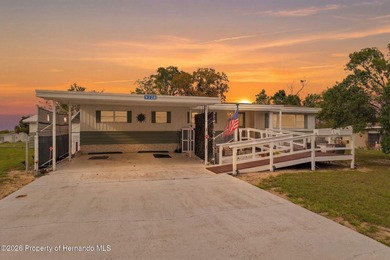 Step into a home that feels welcoming from the moment you arrive on High Point Golf Club, Inc. in Florida - for sale on GolfHomes.com, golf home, golf lot