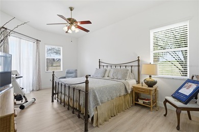 This beautiful 3 bedroom, 3 bath room, 3-car garage home in on Lake Jovita Golf and Country Club in Florida - for sale on GolfHomes.com, golf home, golf lot