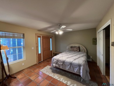 Discover this sweet mountain cabin perfectly situated along the on Pendaries Village Community Assoc. in New Mexico - for sale on GolfHomes.com, golf home, golf lot