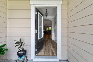 Stunning 3BR, 2 Bath home with large open living spaces on Canongate Golf At Sun City Peachtree in Georgia - for sale on GolfHomes.com, golf home, golf lot