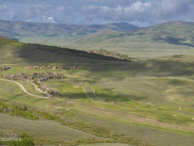 Perched on a scenic ridge with sweeping views of open space on Headwaters Golf Course At Granby Ranch in Colorado - for sale on GolfHomes.com, golf home, golf lot
