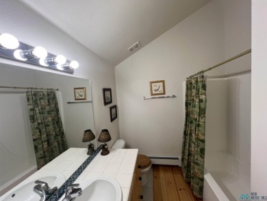 Discover this sweet mountain cabin perfectly situated along the on Pendaries Village Community Assoc. in New Mexico - for sale on GolfHomes.com, golf home, golf lot