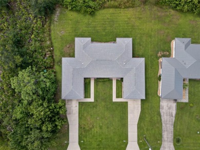 GREAT INCOME PRODUCING OPPORTUNITY! DEEP CREEK DUPLEX! RENT ONE on Deep Creek Golf Club in Florida - for sale on GolfHomes.com, golf home, golf lot