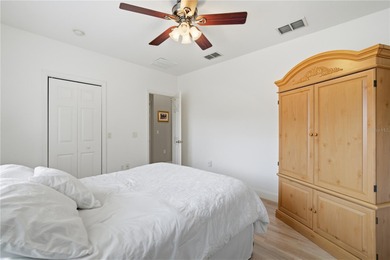 This beautiful 3 bedroom, 3 bath room, 3-car garage home in on Lake Jovita Golf and Country Club in Florida - for sale on GolfHomes.com, golf home, golf lot