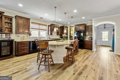 Stunning 3BR, 2 Bath home with large open living spaces on Canongate Golf At Sun City Peachtree in Georgia - for sale on GolfHomes.com, golf home, golf lot