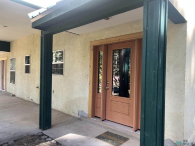 Discover this sweet mountain cabin perfectly situated along the on Pendaries Village Community Assoc. in New Mexico - for sale on GolfHomes.com, golf home, golf lot