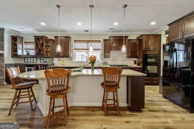 Stunning 3BR, 2 Bath home with large open living spaces on Canongate Golf At Sun City Peachtree in Georgia - for sale on GolfHomes.com, golf home, golf lot