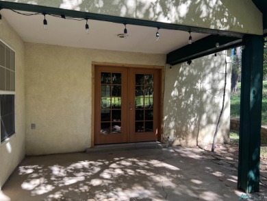 Discover this sweet mountain cabin perfectly situated along the on Pendaries Village Community Assoc. in New Mexico - for sale on GolfHomes.com, golf home, golf lot