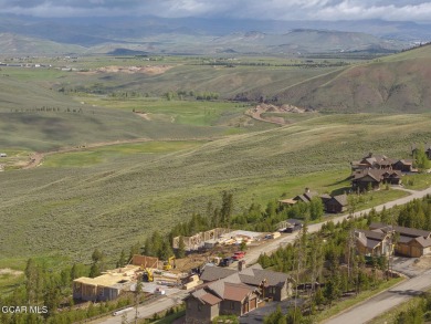 Perched on a scenic ridge with sweeping views of open space on Headwaters Golf Course At Granby Ranch in Colorado - for sale on GolfHomes.com, golf home, golf lot