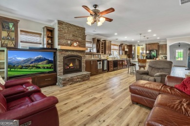 Stunning 3BR, 2 Bath home with large open living spaces on Canongate Golf At Sun City Peachtree in Georgia - for sale on GolfHomes.com, golf home, golf lot