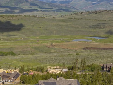 Perched on a scenic ridge with sweeping views of open space on Headwaters Golf Course At Granby Ranch in Colorado - for sale on GolfHomes.com, golf home, golf lot