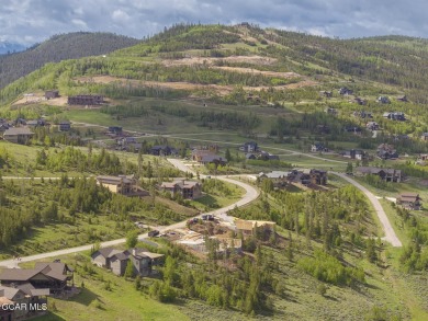 Perched on a scenic ridge with sweeping views of open space on Headwaters Golf Course At Granby Ranch in Colorado - for sale on GolfHomes.com, golf home, golf lot