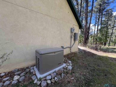 Discover this sweet mountain cabin perfectly situated along the on Pendaries Village Community Assoc. in New Mexico - for sale on GolfHomes.com, golf home, golf lot