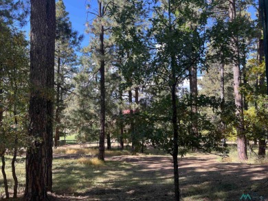 Discover this sweet mountain cabin perfectly situated along the on Pendaries Village Community Assoc. in New Mexico - for sale on GolfHomes.com, golf home, golf lot