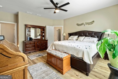 Stunning 3BR, 2 Bath home with large open living spaces on Canongate Golf At Sun City Peachtree in Georgia - for sale on GolfHomes.com, golf home, golf lot