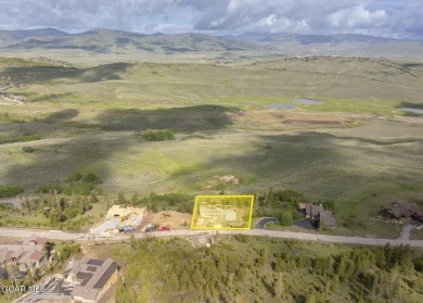 Perched on a scenic ridge with sweeping views of open space on Headwaters Golf Course At Granby Ranch in Colorado - for sale on GolfHomes.com, golf home, golf lot