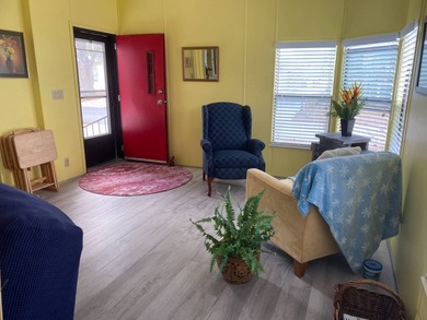 Fully furnished 2/2 home in vibrant 55+ community on leased land on Spanish Lakes Fairways in Florida - for sale on GolfHomes.com, golf home, golf lot