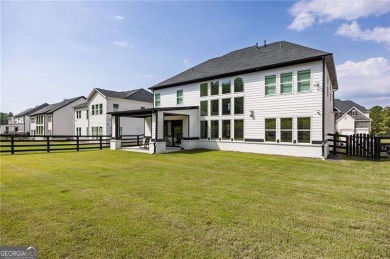Welcome home to this executive home built by the Toll Brothers on Capital City Club Crabapple in Georgia - for sale on GolfHomes.com, golf home, golf lot