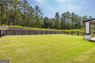 Welcome home to this executive home built by the Toll Brothers on Capital City Club Crabapple in Georgia - for sale on GolfHomes.com, golf home, golf lot