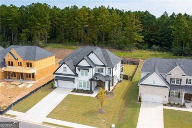 Welcome home to this executive home built by the Toll Brothers on Capital City Club Crabapple in Georgia - for sale on GolfHomes.com, golf home, golf lot