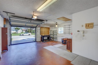 Nestled in one of the most sought after streets in the comunity on Highland Lakes Executive Golf Course in Florida - for sale on GolfHomes.com, golf home, golf lot