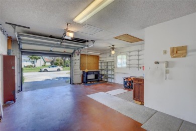 Nestled in one of the most sought after streets in the comunity on Highland Lakes Executive Golf Course in Florida - for sale on GolfHomes.com, golf home, golf lot