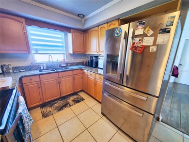 Nicely updated 3 Bedroom Home with pool, A. C. Kitchen with wood on Rotonda Golf and Country Club The Hills Course in Florida - for sale on GolfHomes.com, golf home, golf lot