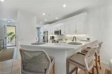 Stunning top-floor penthouse condo in the premier bundled-golf on Naples Lakes Country Club in Florida - for sale on GolfHomes.com, golf home, golf lot