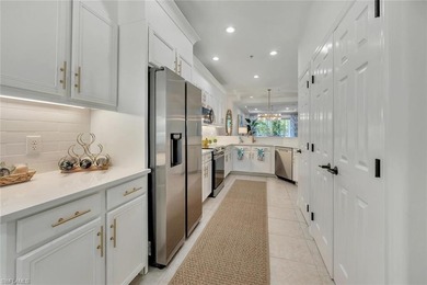 Stunning top-floor penthouse condo in the premier bundled-golf on Naples Lakes Country Club in Florida - for sale on GolfHomes.com, golf home, golf lot