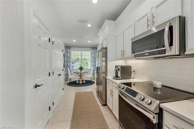 Stunning top-floor penthouse condo in the premier bundled-golf on Naples Lakes Country Club in Florida - for sale on GolfHomes.com, golf home, golf lot