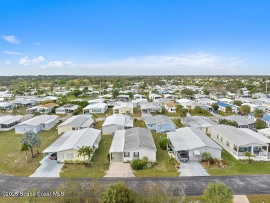 New roof coming; AC is 2018; double driveway. This home is one on Barefoot Bay Golf Course in Florida - for sale on GolfHomes.com, golf home, golf lot