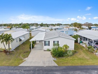 New roof coming; AC is 2018; double driveway. This home is one on Barefoot Bay Golf Course in Florida - for sale on GolfHomes.com, golf home, golf lot