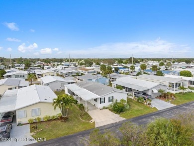 New roof coming; AC is 2018; double driveway. This home is one on Barefoot Bay Golf Course in Florida - for sale on GolfHomes.com, golf home, golf lot