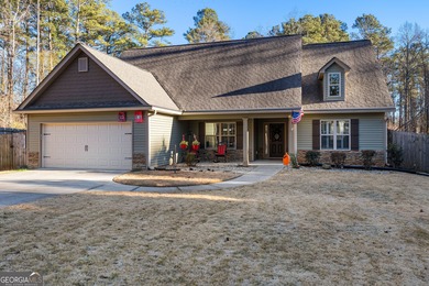Nestled in a quiet cul-de-sac, this 3-bedroom, 2-bathroom ranch on Canongate On White Oak Golf Course in Georgia - for sale on GolfHomes.com, golf home, golf lot