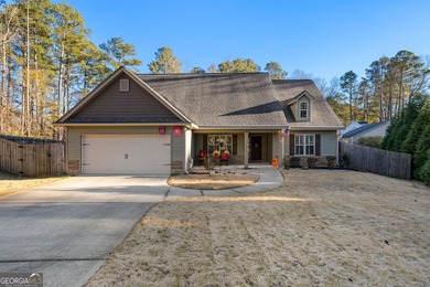 Nestled in a quiet cul-de-sac, this 3-bedroom, 2-bathroom ranch on Canongate On White Oak Golf Course in Georgia - for sale on GolfHomes.com, golf home, golf lot