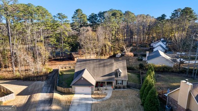 Nestled in a quiet cul-de-sac, this 3-bedroom, 2-bathroom ranch on Canongate On White Oak Golf Course in Georgia - for sale on GolfHomes.com, golf home, golf lot