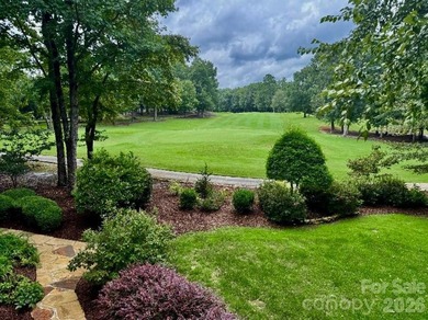 Nestled on the 6th green of The Old North State Club, 117 on Old North State Club at Uwharrie Point Golf community in North Carolina - for sale on GolfHomes.com, golf home, golf lot