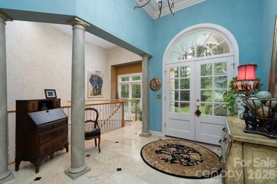 Nestled on the 6th green of The Old North State Club, 117 on Old North State Club at Uwharrie Point Golf community in North Carolina - for sale on GolfHomes.com, golf home, golf lot