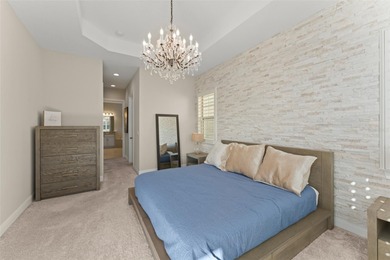 Discover peace and tranquility in this stunning premium on Eagle Creek Golf Club in Florida - for sale on GolfHomes.com, golf home, golf lot