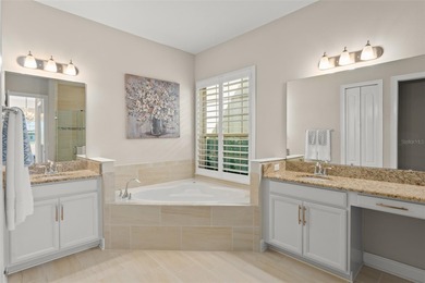 Discover peace and tranquility in this stunning premium on Eagle Creek Golf Club in Florida - for sale on GolfHomes.com, golf home, golf lot