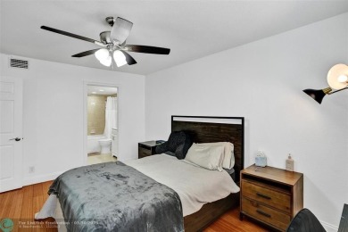 Beautiful lake view 2BR/2BA condo in Pine Island Ridge! Spacious on Pine Island Ridge Country Club in Florida - for sale on GolfHomes.com, golf home, golf lot