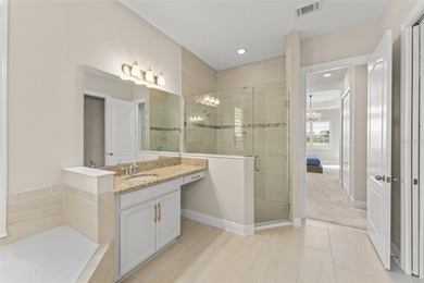 Discover peace and tranquility in this stunning premium on Eagle Creek Golf Club in Florida - for sale on GolfHomes.com, golf home, golf lot