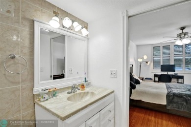 Beautiful lake view 2BR/2BA condo in Pine Island Ridge! Spacious on Pine Island Ridge Country Club in Florida - for sale on GolfHomes.com, golf home, golf lot