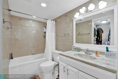 Beautiful lake view 2BR/2BA condo in Pine Island Ridge! Spacious on Pine Island Ridge Country Club in Florida - for sale on GolfHomes.com, golf home, golf lot