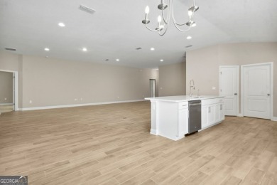 Welcome to your dream home in the prestigious gated community of on The Club At Osprey Cove in Georgia - for sale on GolfHomes.com, golf home, golf lot