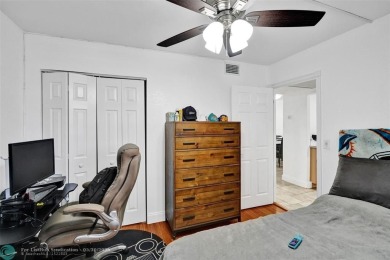 Beautiful lake view 2BR/2BA condo in Pine Island Ridge! Spacious on Pine Island Ridge Country Club in Florida - for sale on GolfHomes.com, golf home, golf lot