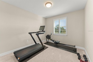 Discover peace and tranquility in this stunning premium on Eagle Creek Golf Club in Florida - for sale on GolfHomes.com, golf home, golf lot