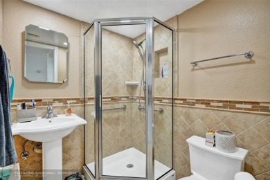 Beautiful lake view 2BR/2BA condo in Pine Island Ridge! Spacious on Pine Island Ridge Country Club in Florida - for sale on GolfHomes.com, golf home, golf lot