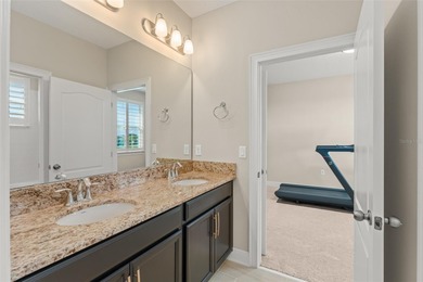 Discover peace and tranquility in this stunning premium on Eagle Creek Golf Club in Florida - for sale on GolfHomes.com, golf home, golf lot